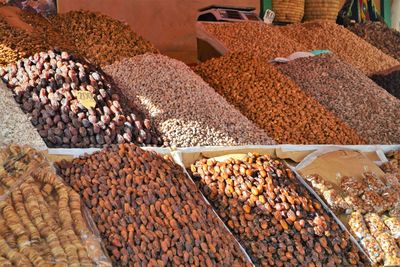 Various dried fruits for sale at market stall