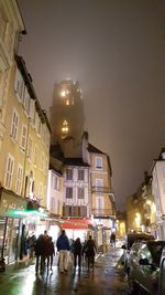 View of city lit up at night