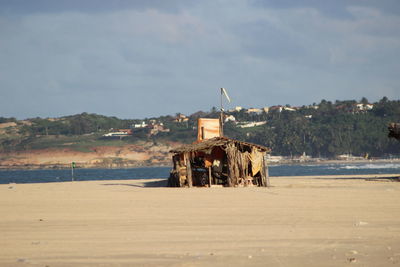 Built structure against cloudy sky