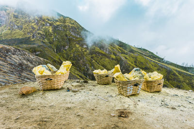 Traditional raw sulfur from ijen crater mining in banyuwangi, east java, indonesia