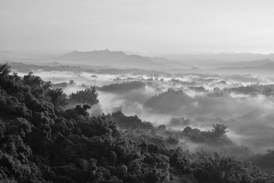 High angle view of mountain against cloudy sky