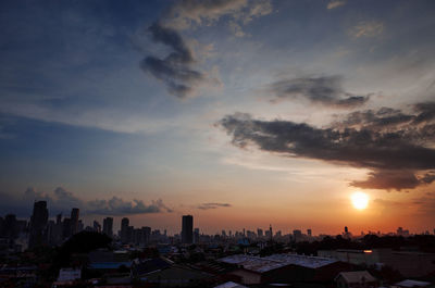 View of cityscape at sunset