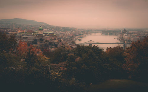 High angle view of city during sunset