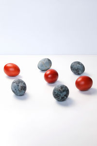 Close-up of macaroons against white background