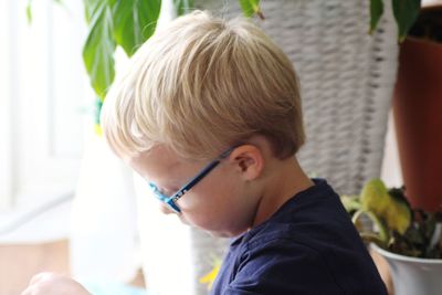 Close-up portrait of boy looking away