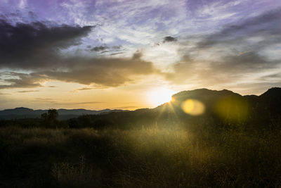 Scenic view of landscape against sky during sunset