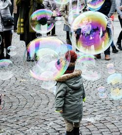 Rear view of a woman with bubbles