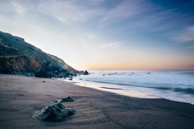 Scenic view of beach against sky