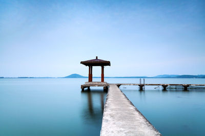 Scenic view of calm sea against blue sky