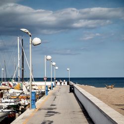 Pier over sea against sky