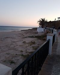 Scenic view of beach against clear sky