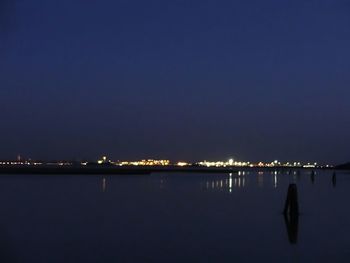 Scenic view of sea against sky at night