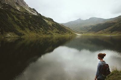 Man looking at lake