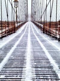 View of suspension bridge in foggy weather