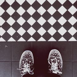 Pair of shoes on tiled floor