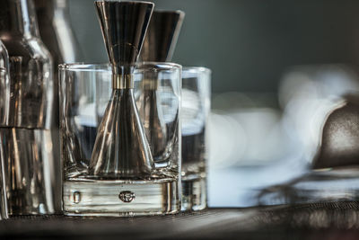 Close-up of glasses on table