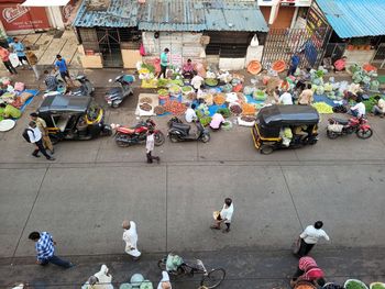 High angle view of people on street in city