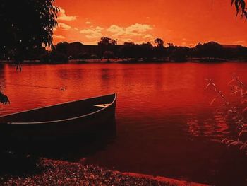 Silhouette of boat at sunset