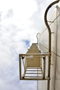 Low angle view of ladder against sky