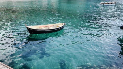 High angle view of boat moored on sea