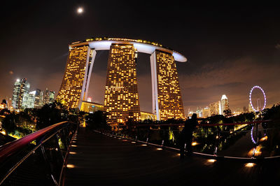 Low angle view of illuminated ferris wheel