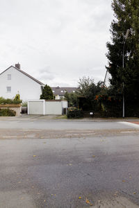 View of road along buildings