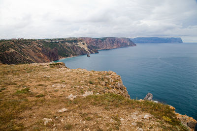 Landscape with rocks by the sea and beautiful sky. ancient coral reef.