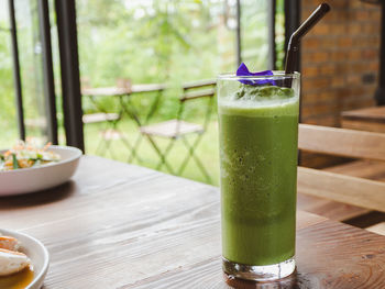 Green drink on table