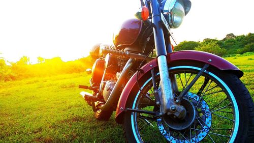 Bicycle on field against sky