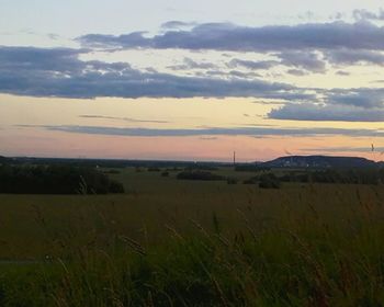 Scenic view of landscape against sky during sunset