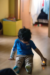 View of boy playing in a open space