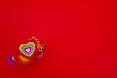 Close-up of cupcakes against red background