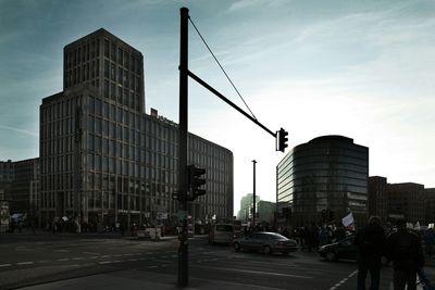 City street against cloudy sky