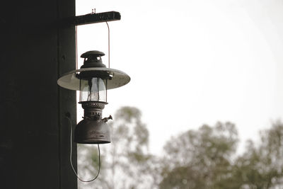 Low angle view of street light against sky