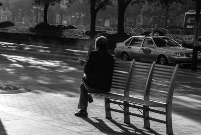 People on road in city