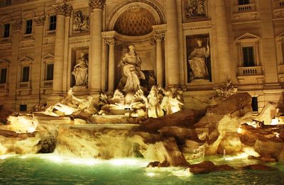 Statue in illuminated building