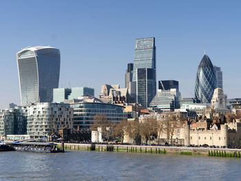 City lit up at waterfront