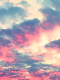 Low angle view of dramatic sky during sunset