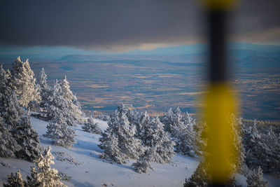 Scenic view of snowcapped mountain against sky