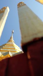 Low angle view of statue of temple against clear sky