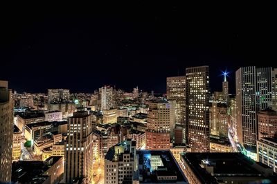 Illuminated cityscape at night