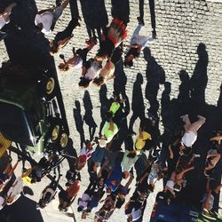 High angle view of people walking on street