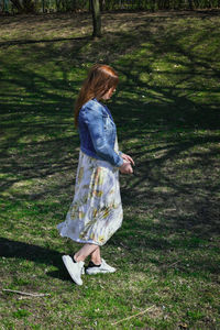 Woman standing on field