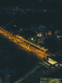 High angle view of illuminated city at night