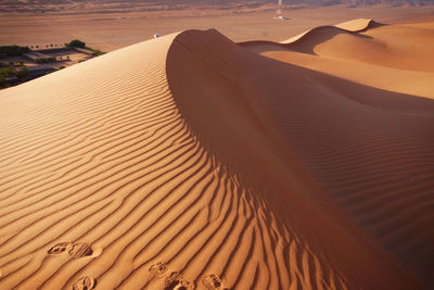 Full frame shot of foot prints in sand dune