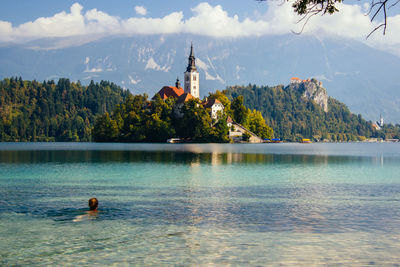 View of lake against cloudy sky