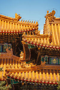 Low angle view of temple building against sky