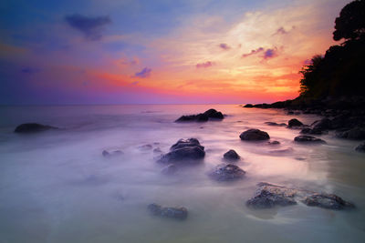 Scenic view of sea against sky during sunset