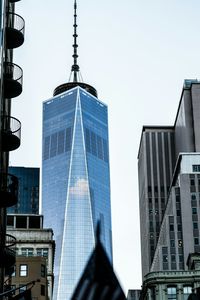 Low angle view of modern buildings against clear sky