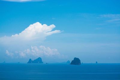 Scenic view of sea against blue sky